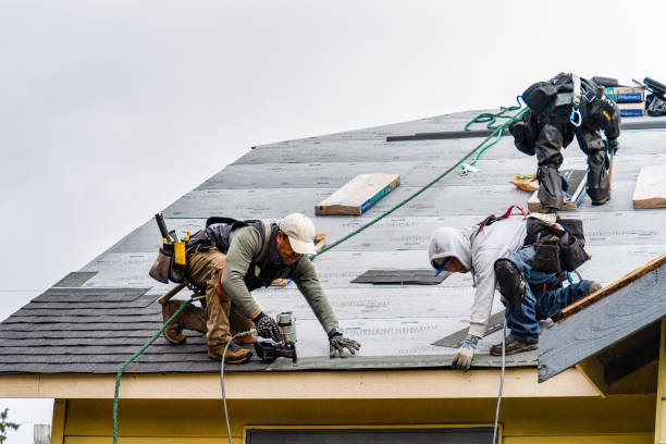 Professional Roofing technician working in Gillett, PA
